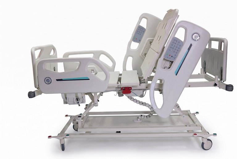 Santron Pro ICU Bed, backrest raised, rail control panels visible, side studio view